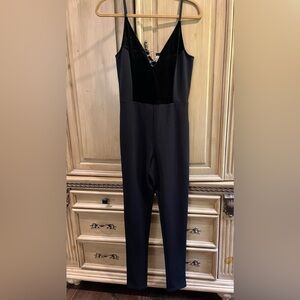 Women’s brand new black velvet jumpsuit
